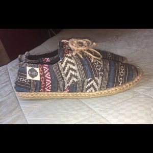 Brand new pair of Ollies shoes.